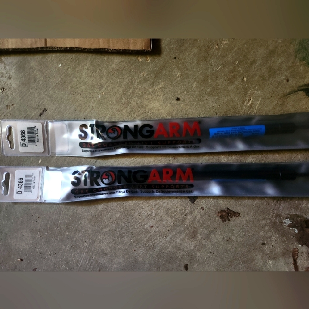Strong arm gas lift support for car